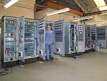 Distributor and forehearth control panels under assembly at Electroglass’ headquarters in the UK.